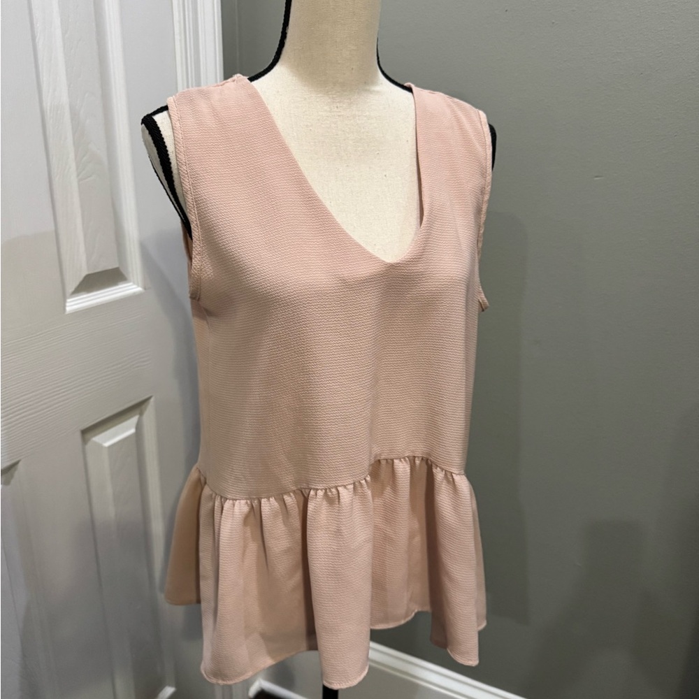 Caramela Blush Sleeveless Peplum Blouse